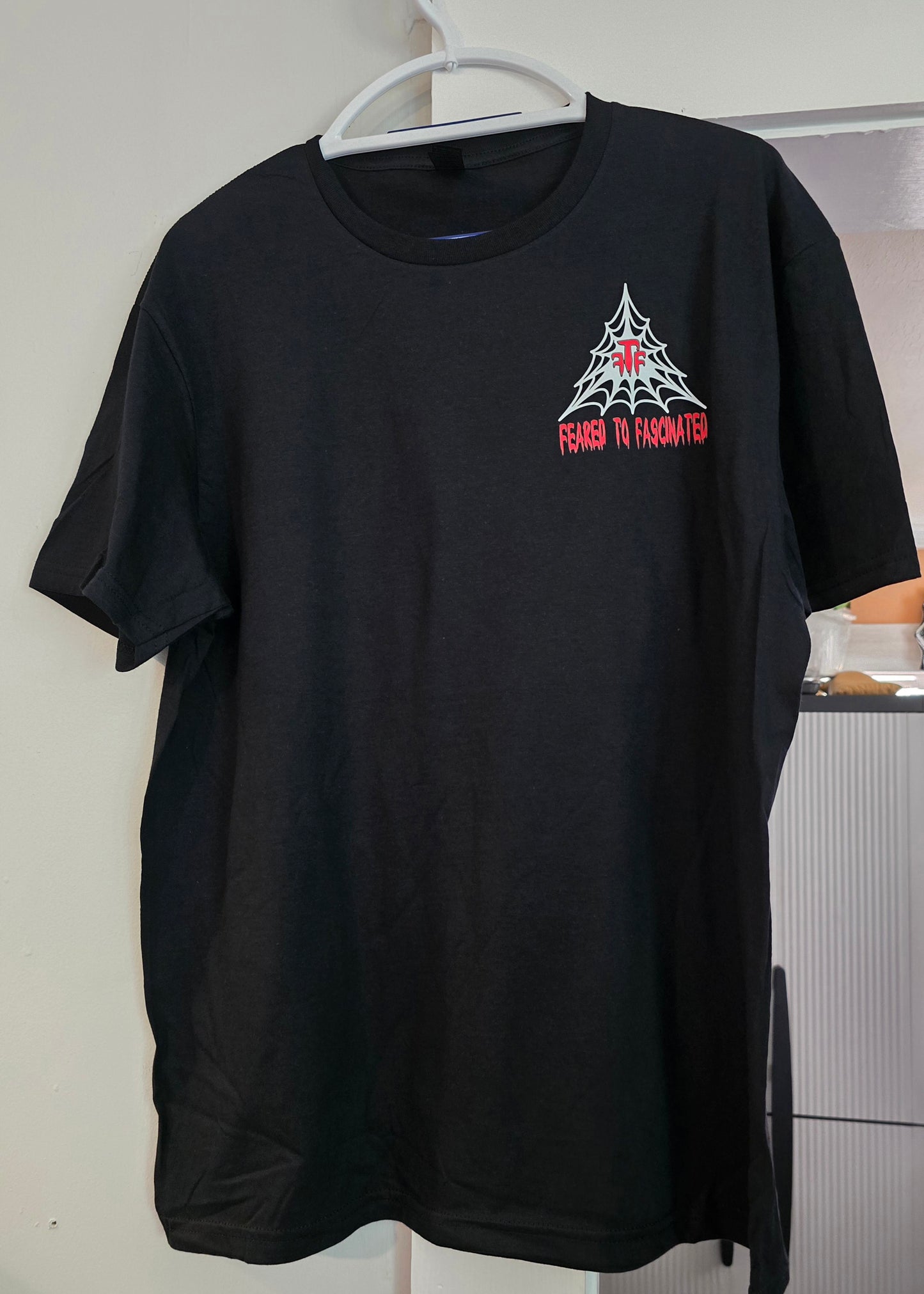 Black "New Design" Tshirt